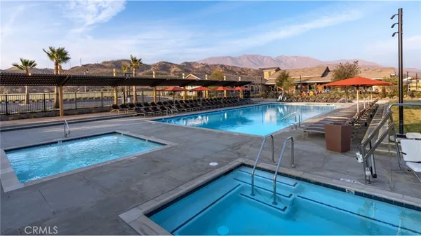 a view of a swimming pool with a mountain