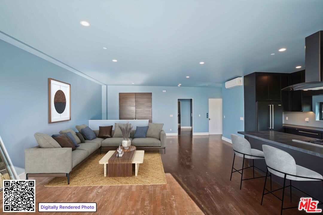 4063 Latigo Canyon Road Malibu, CA 90265 - Photo 11 of 33 a living room with furniture and a wooden floor