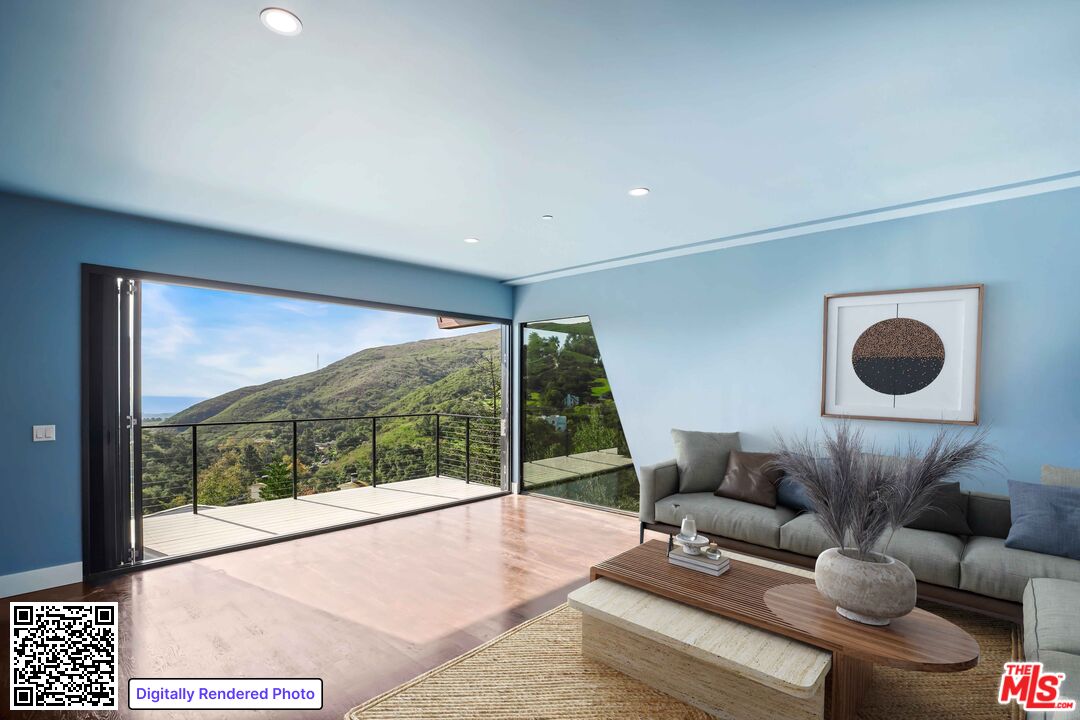 4063 Latigo Canyon Road Malibu, CA 90265 - Photo 7 of 33 a living room with furniture and a floor to ceiling window