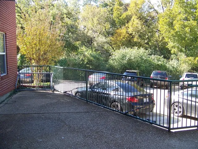 a view of street from balcony