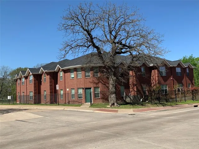 front view of a building with a street