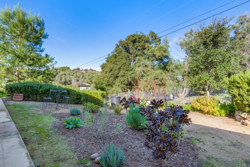 1106 Big Oak Ranch Road Fallbrook, CA 92028 - Photo 12 of 53 a view of a garden with plants and large trees