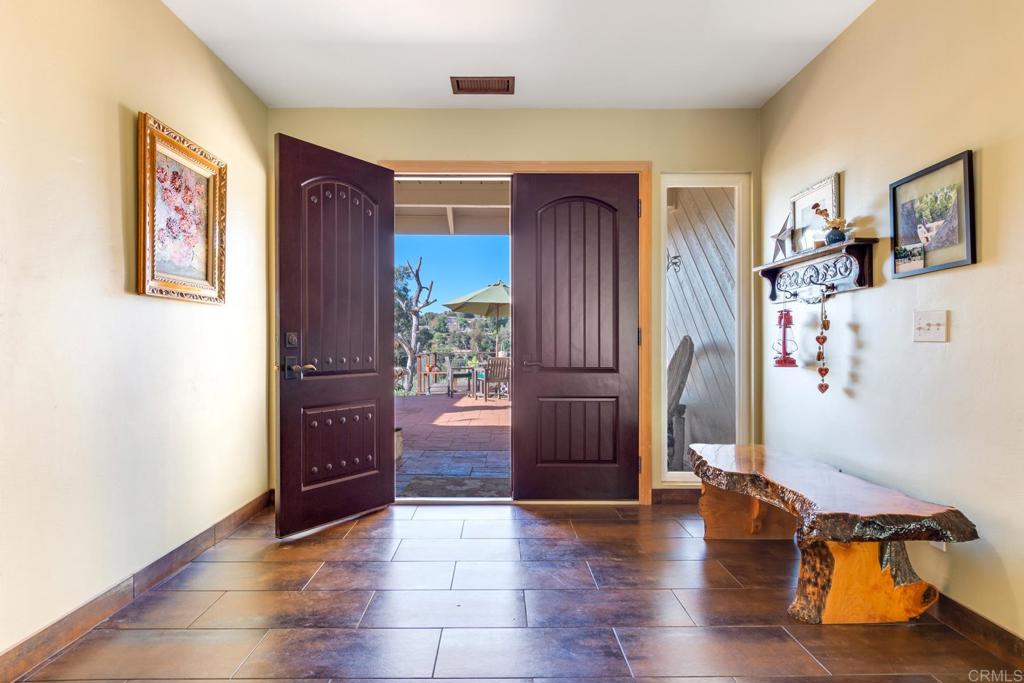 1106 Big Oak Ranch Road Fallbrook, CA 92028 - Photo 15 of 53 a view of livingroom with hardwood floor and hallway