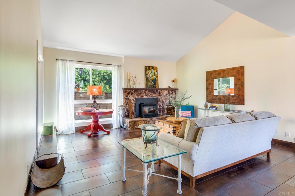 1106 Big Oak Ranch Road Fallbrook, CA 92028 - Photo 16 of 53 a living room with furniture and a fireplace
