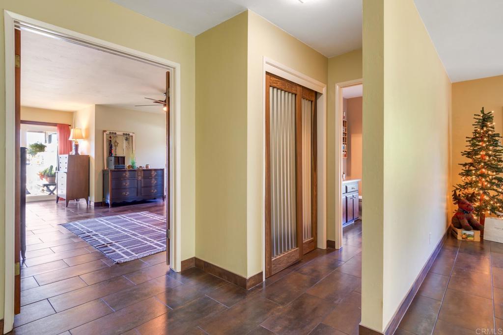 1106 Big Oak Ranch Road Fallbrook, CA 92028 - Photo 22 of 53 a view of a hallway view with wooden floor and living room