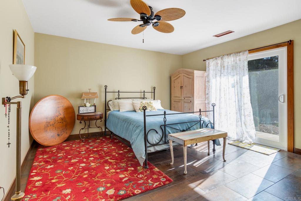 1106 Big Oak Ranch Road Fallbrook, CA 92028 - Photo 24 of 53 a bedroom with furniture and a window