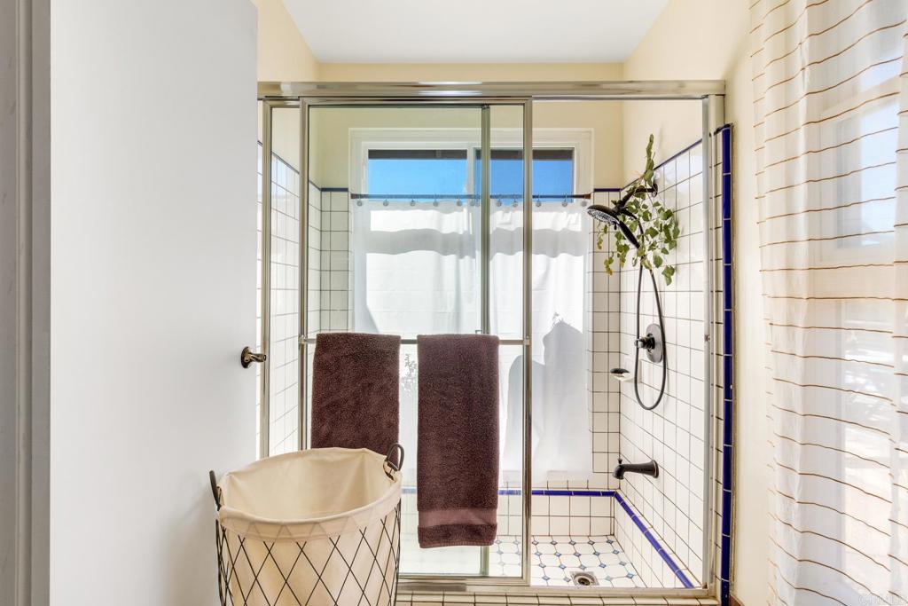 1106 Big Oak Ranch Road Fallbrook, CA 92028 - Photo 29 of 53 a bathroom with a bathtub and shower