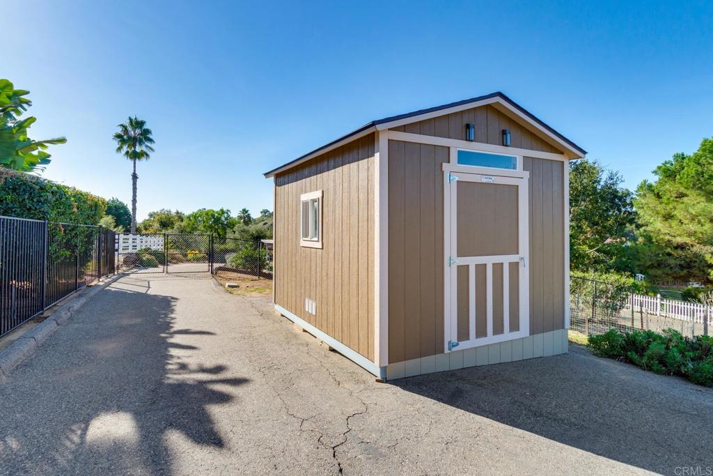 1106 Big Oak Ranch Road Fallbrook, CA 92028 - Photo 46 of 53 a front view of a house with a yard