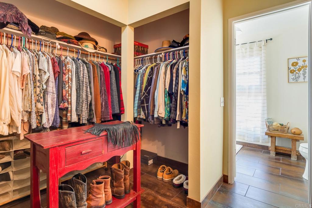 1106 Big Oak Ranch Road Fallbrook, CA 92028 - Photo 49 of 53 a view of walk in closet with clothes and shoes