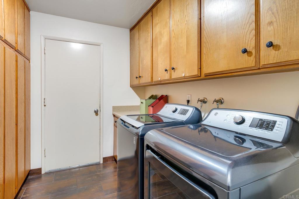 1106 Big Oak Ranch Road Fallbrook, CA 92028 - Photo 51 of 53 a utility room with dryer and washer