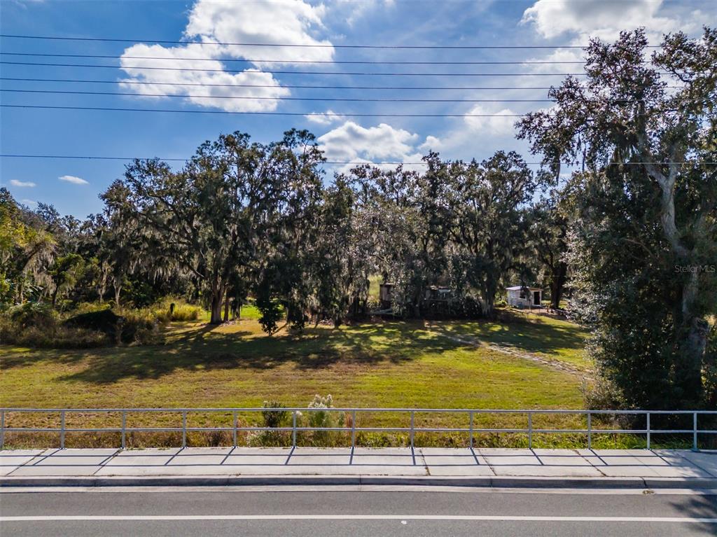 a view of a yard with an outdoor space