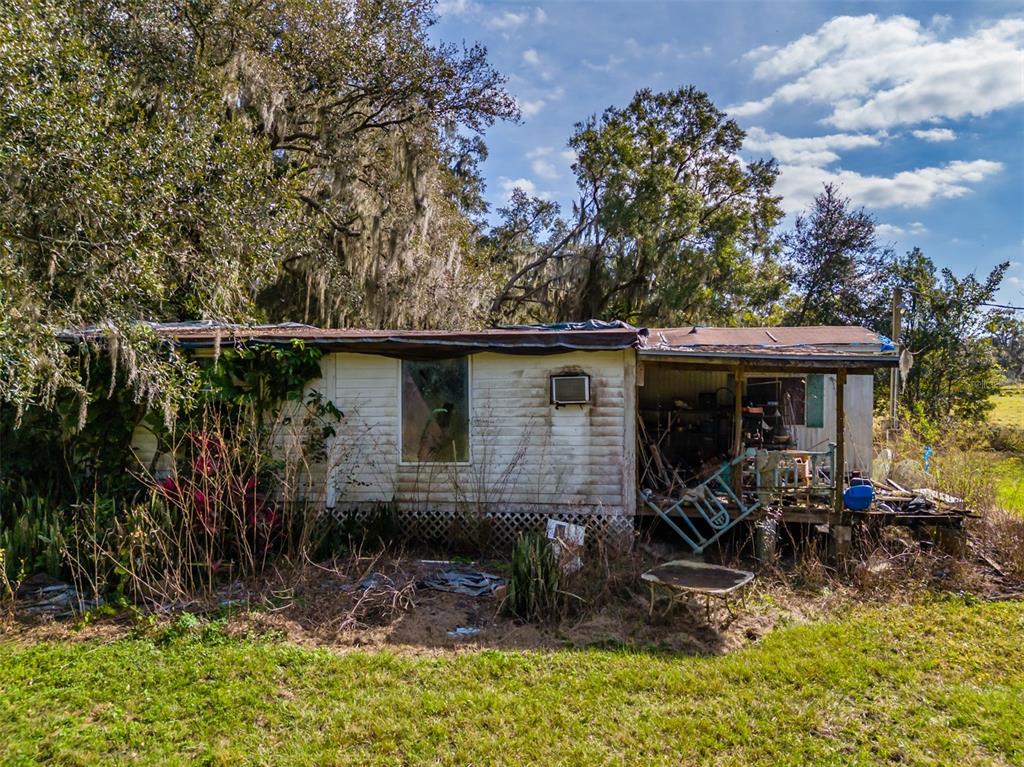 815 East Sam Allen Road Plant City, FL 33563 - Photo 24 of 27 a view of outdoor space yard and patio