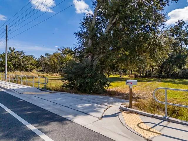 a view of a swimming pool with an outdoor space and seating area