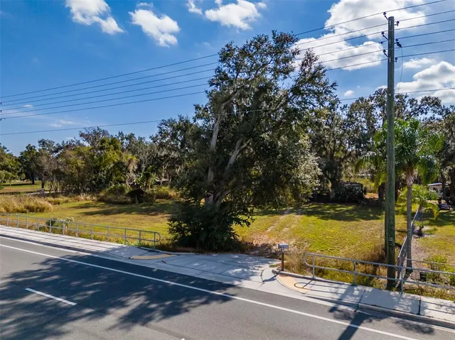 a view of a swimming pool with an outdoor space and seating area