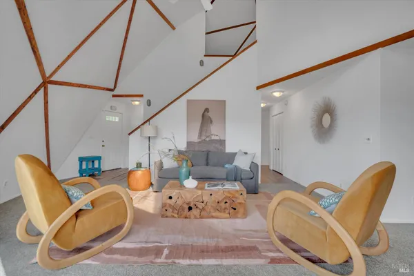 a room with furniture and a wooden floor