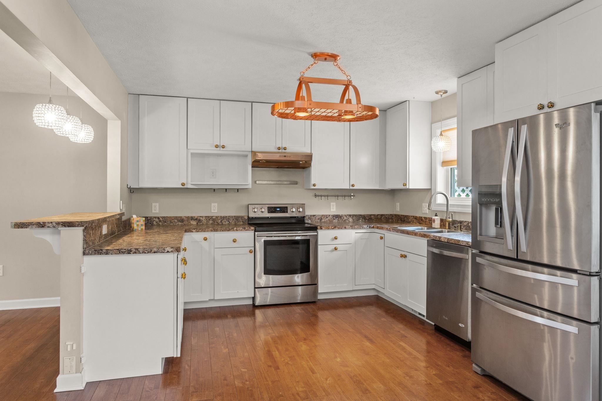 315 Rustic Avenue Broadway, VA 22815 - Photo 5 of 19 with stainless steel appliances and breakfast bar.
