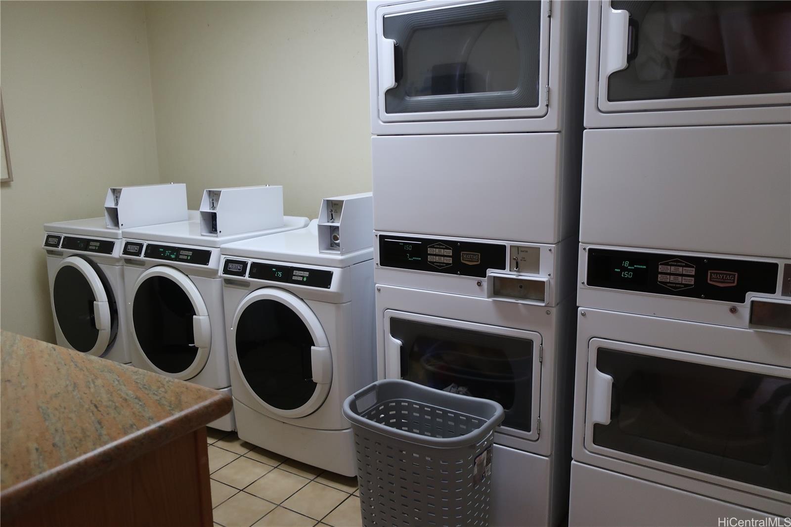5333 Likini Street, Unit 2408 Honolulu, HI 96818 - Photo 13 of 20 a utility room with dryer and washer