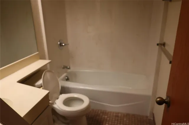 a bathroom with a toilet a sink and a bathtub