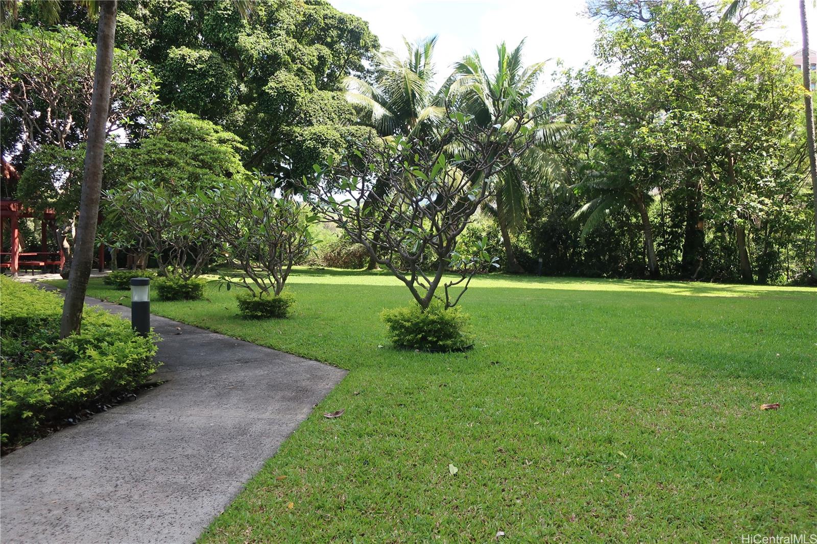 5333 Likini Street, Unit 2408 Honolulu, HI 96818 - Photo 4 of 20 a view of a park with large trees