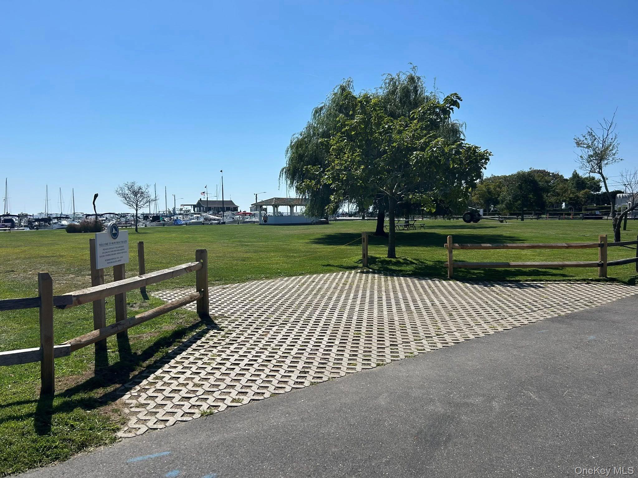 84 Bieselin Road Bellport, NY 11713 - Photo 17 of 20 a view of park with wooden floor