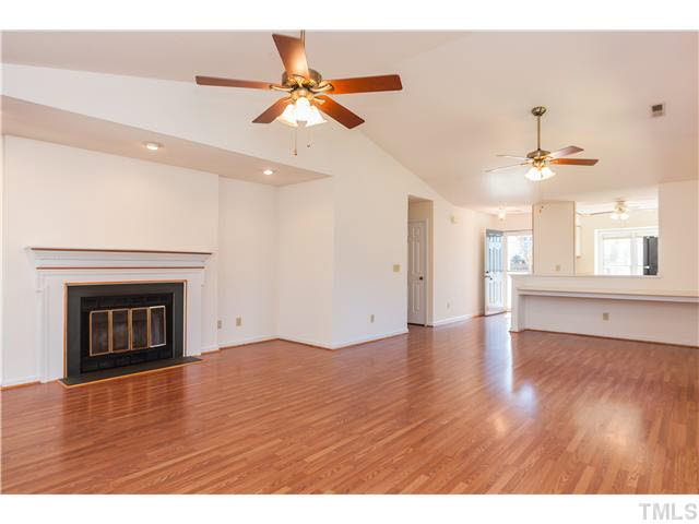2624 Cottage Circle Raleigh, NC 27613 - Photo 1 of 15 Welcome Home! This wonderful great room has Laminate flooring, fireplace, breakfast bar and opens to the light and bright kitchen.