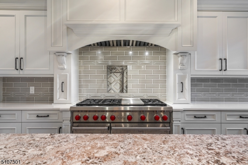 50 Rock Spring Road West Orange, NJ 07052 - Photo 17 of 37 a kitchen with stove and cabinets