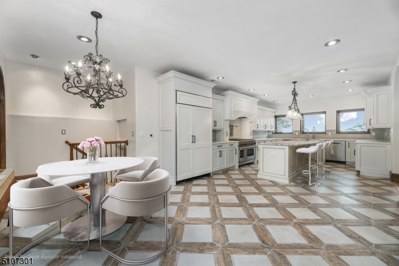 50 Rock Spring Road West Orange, NJ 07052 - Photo 19 of 37 a living room with dining table and chairs