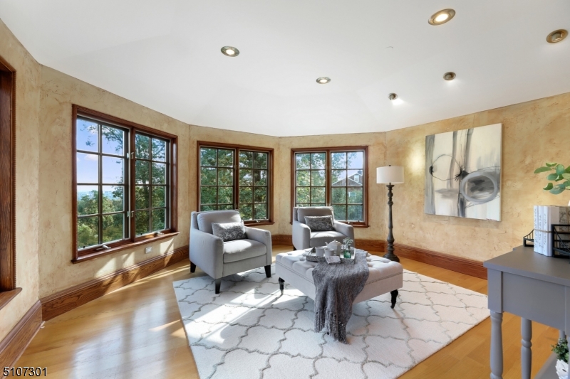 50 Rock Spring Road West Orange, NJ 07052 - Photo 22 of 37 a living room with furniture and large windows