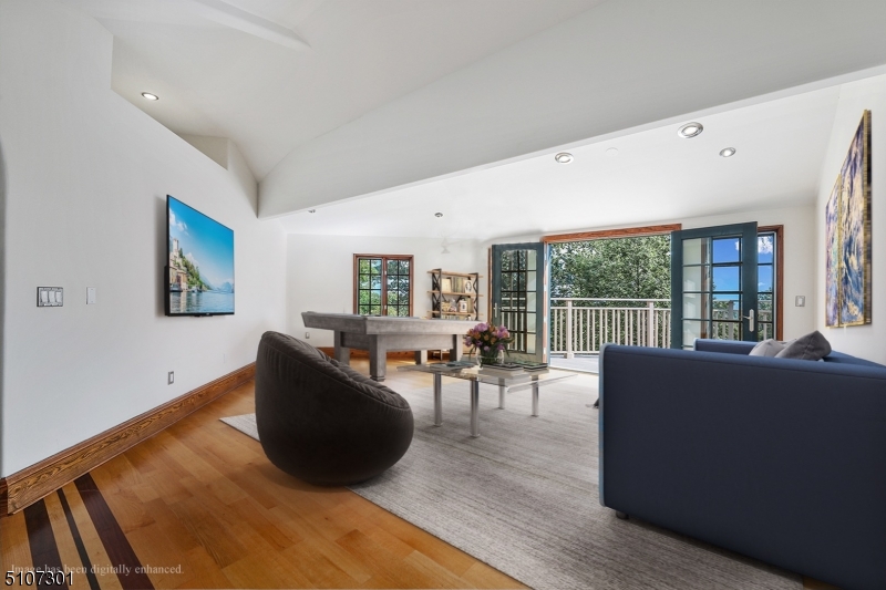 50 Rock Spring Road West Orange, NJ 07052 - Photo 27 of 37 a living room with furniture large windows and wooden floor