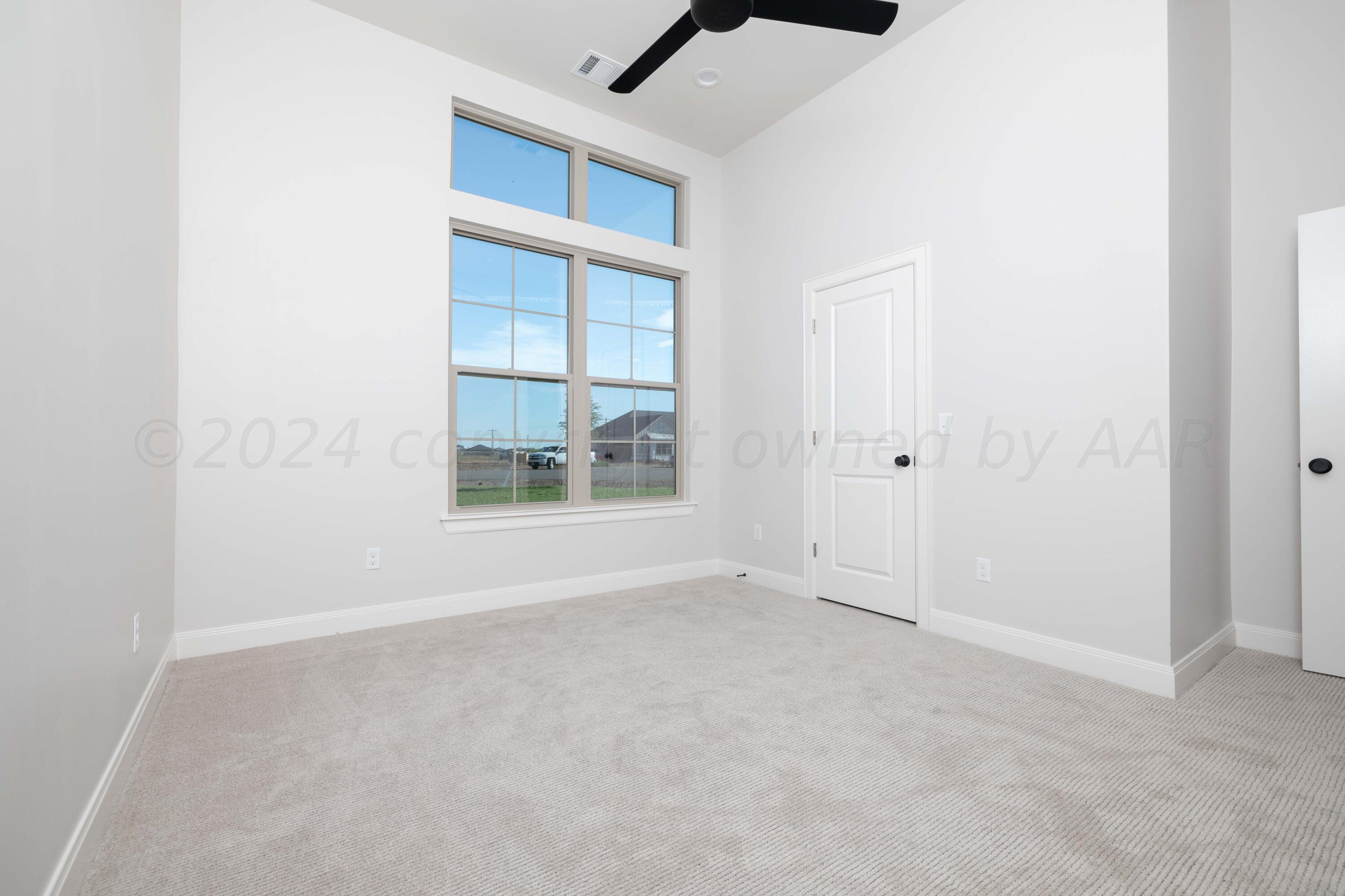 10201 Cactus Flower Road Amarillo, TX 79119 - Photo 20 of 48 an empty room with windows
