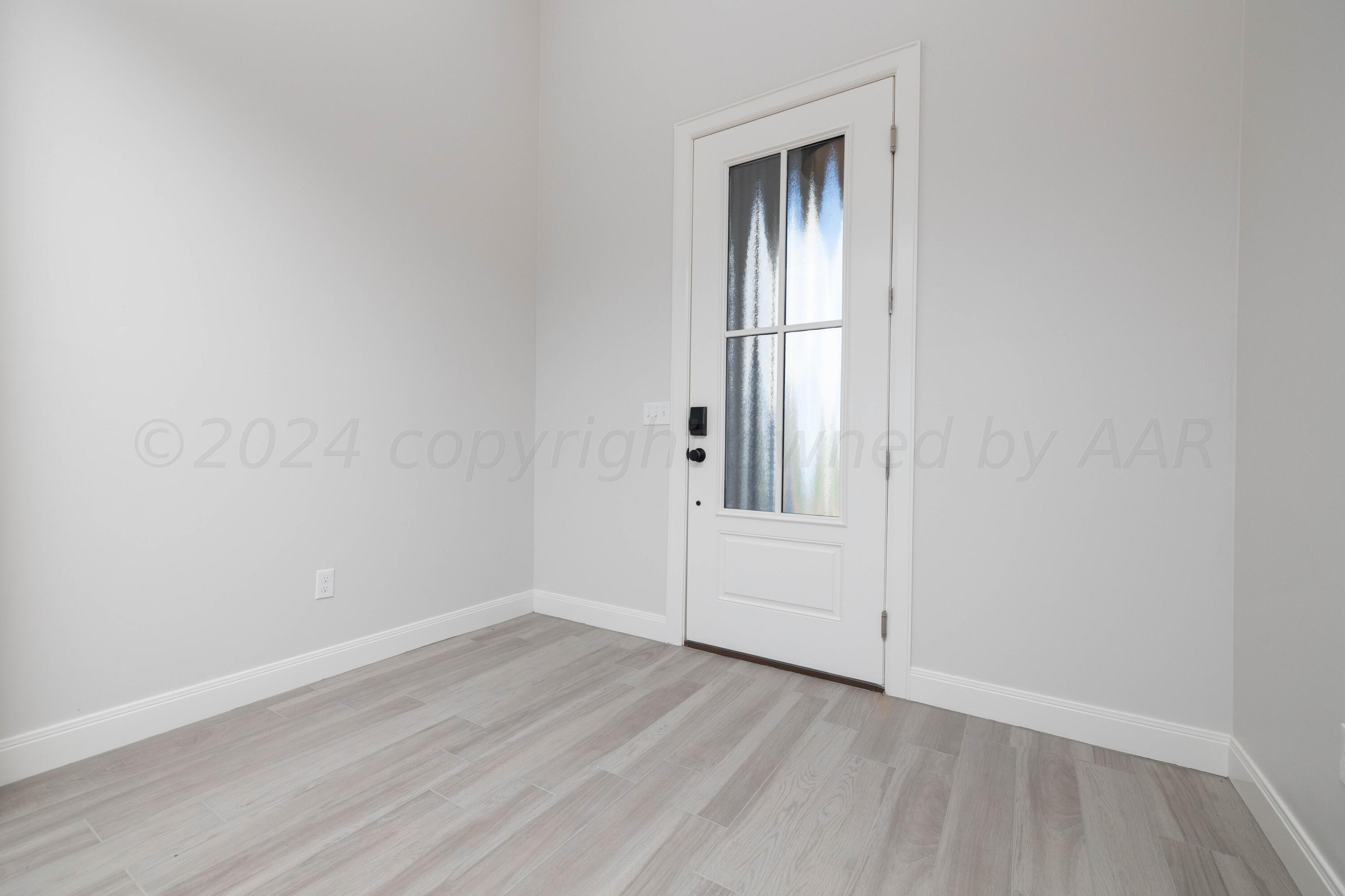 10201 Cactus Flower Road Amarillo, TX 79119 - Photo 21 of 48 a view of empty room with wooden floor and fan