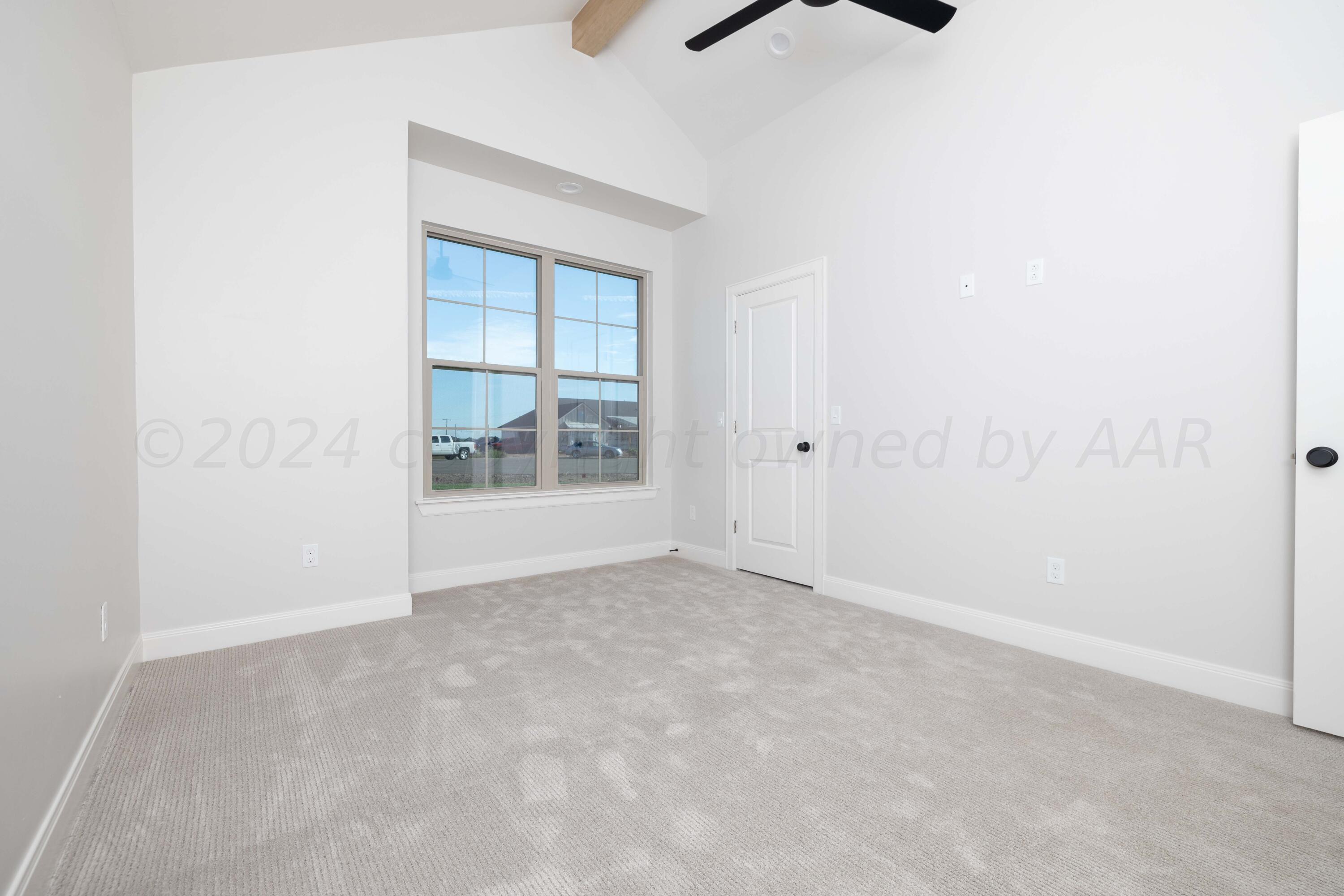 10201 Cactus Flower Road Amarillo, TX 79119 - Photo 22 of 48 a view of an empty room with a window