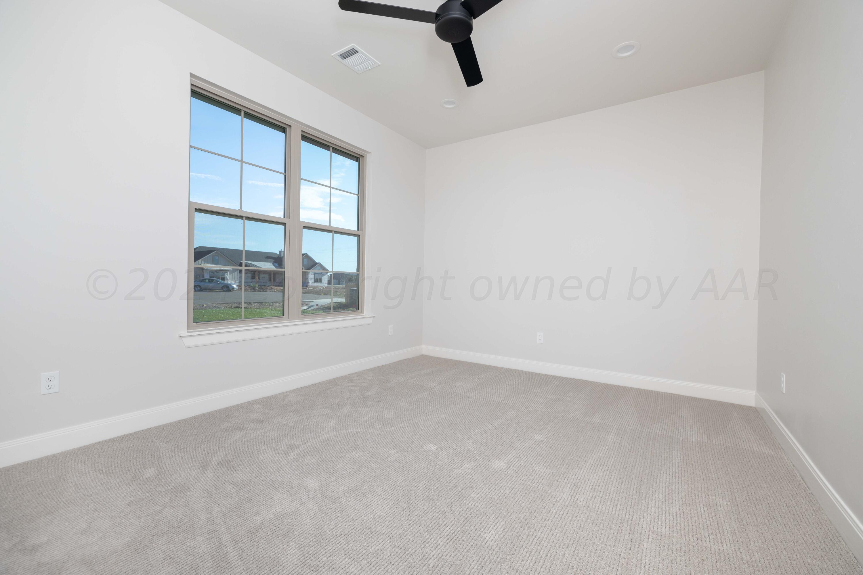 10201 Cactus Flower Road Amarillo, TX 79119 - Photo 23 of 48 an empty room with a window