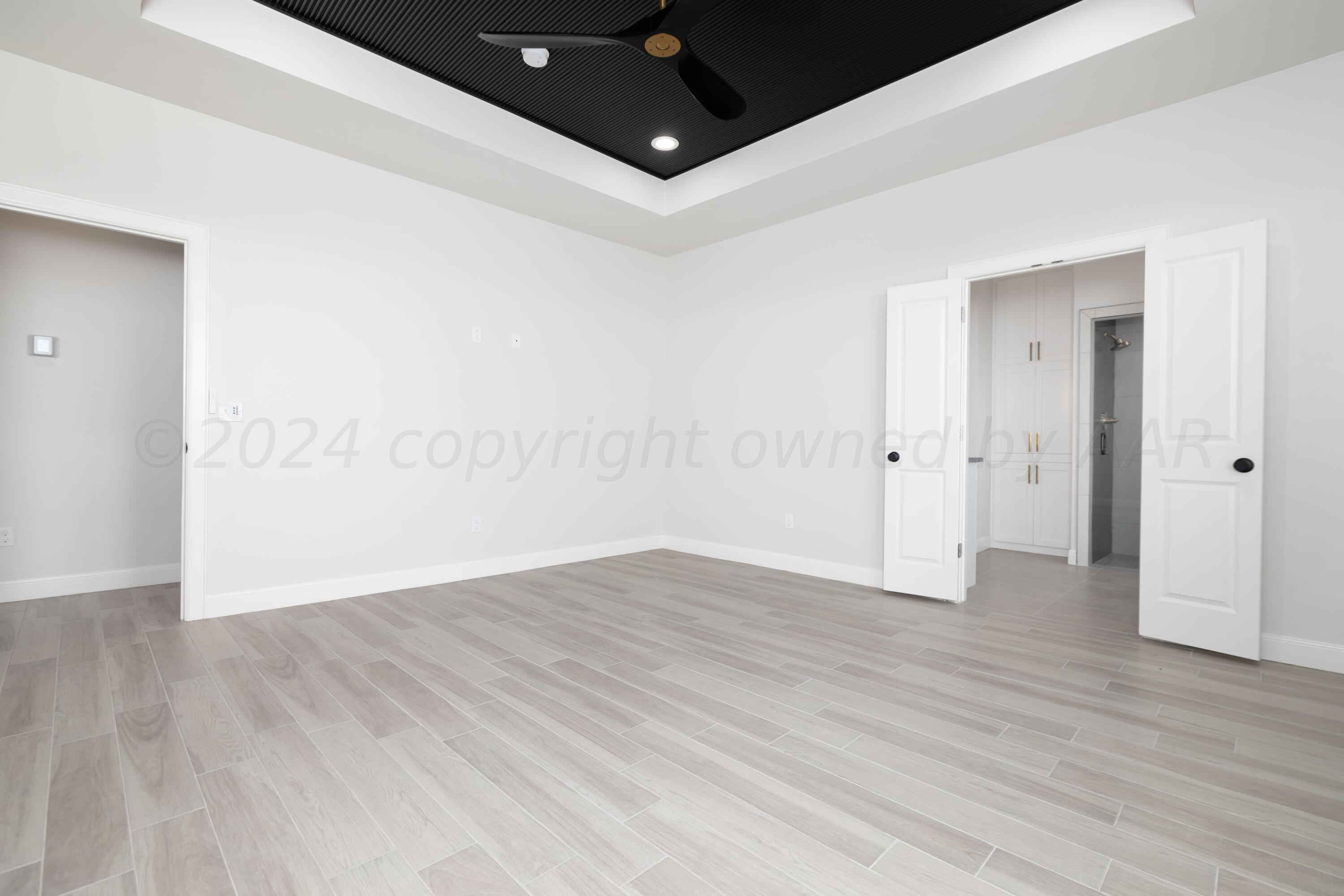 10201 Cactus Flower Road Amarillo, TX 79119 - Photo 30 of 48 wooden floor in an empty room