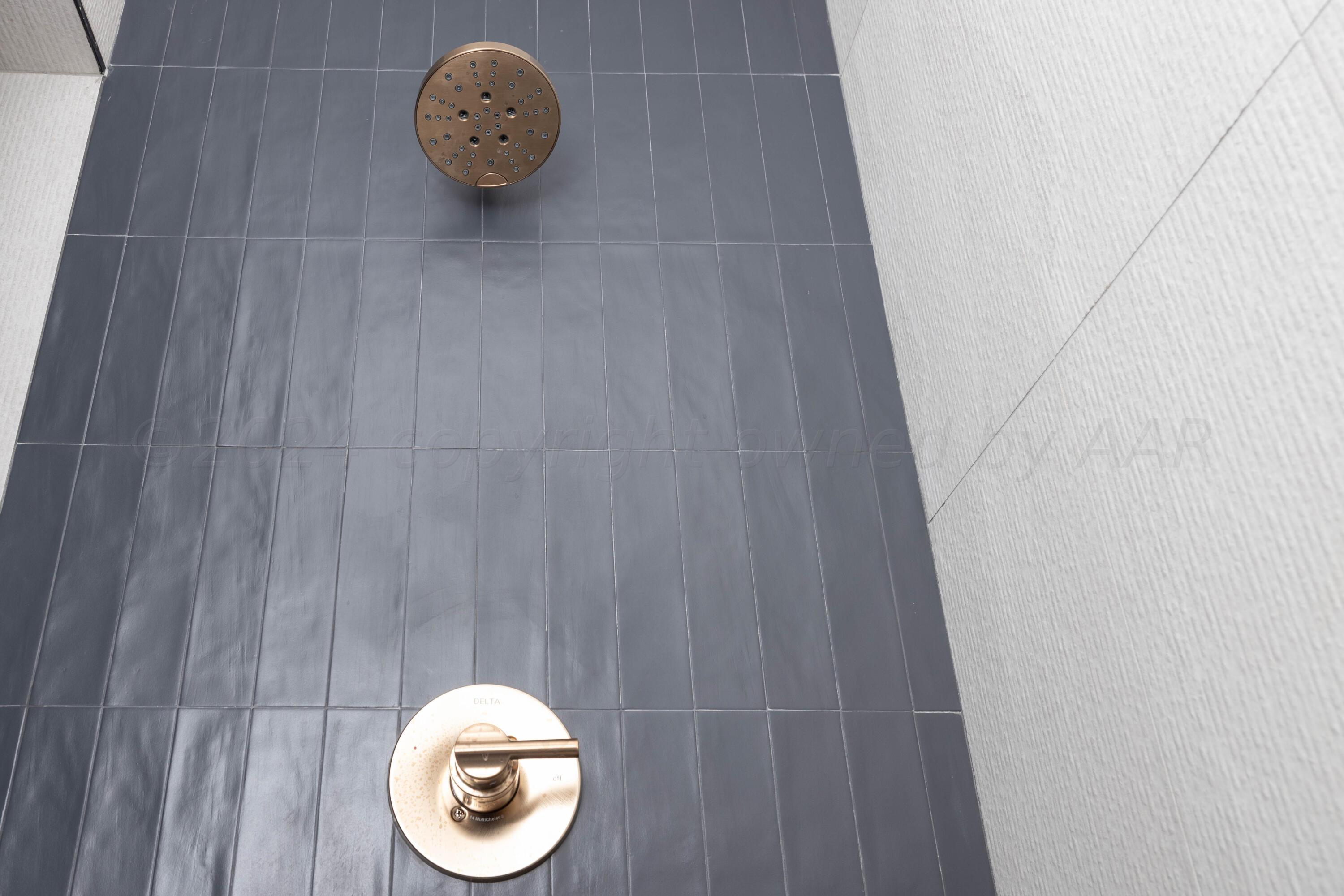 10201 Cactus Flower Road Amarillo, TX 79119 - Photo 35 of 48 a bathroom with a toilet and a shower