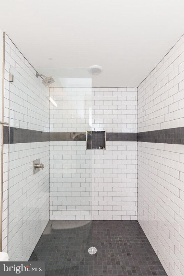 4100 Ludlow Street, Unit 1N Philadelphia, PA 19104 - Photo 12 of 16 a bathroom with a shower