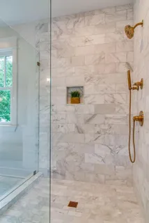 a living room with furniture window and a chandelier