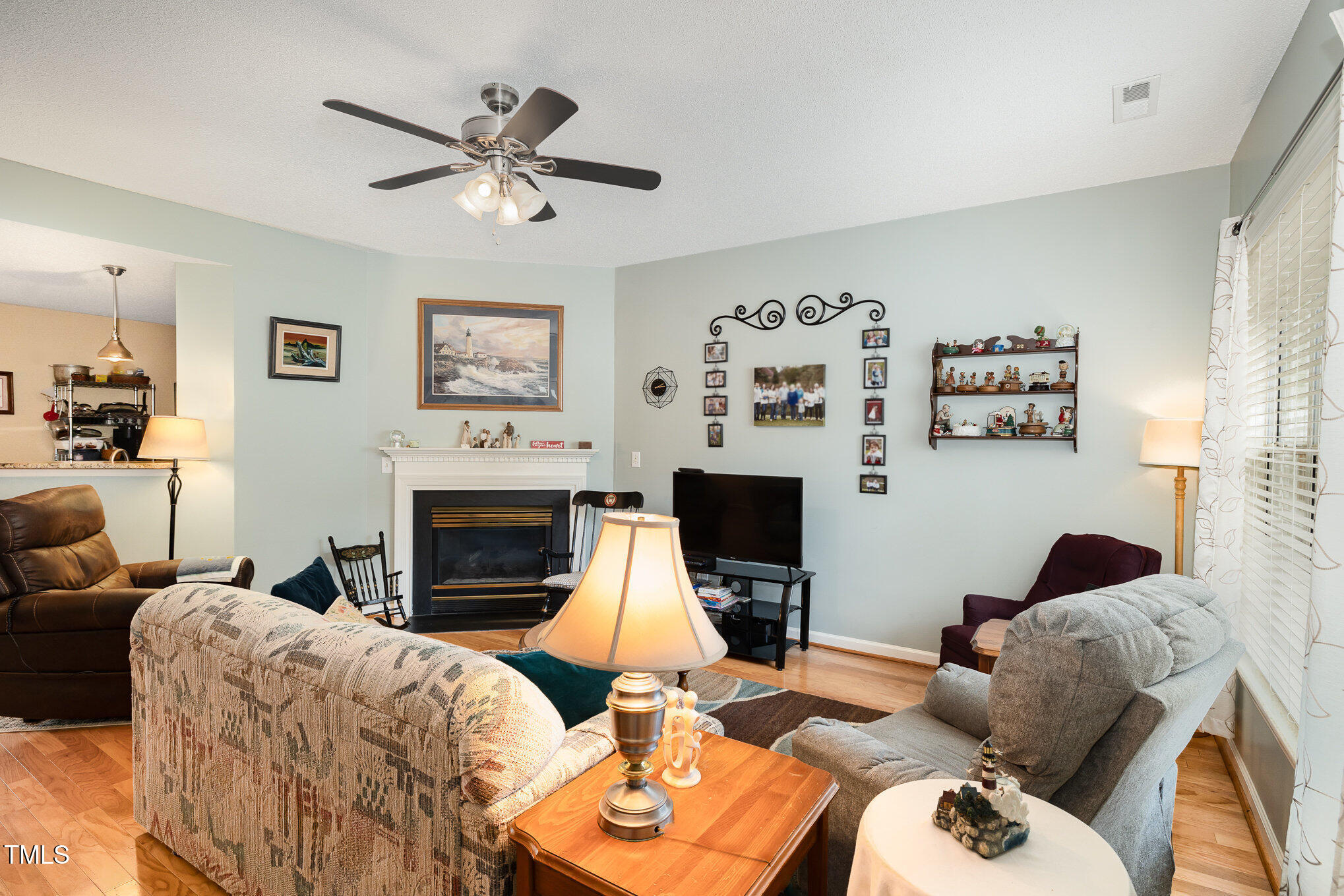 5557 Fieldcross Court Raleigh, NC 27610 - Photo 4 of 16 Family Room with Gas Fireplace