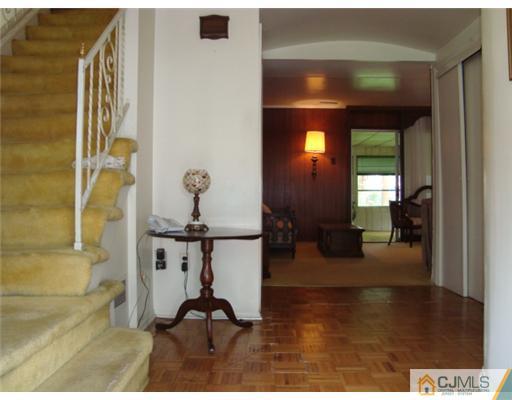 12 Hilltop Road Edison, NJ 08820 - Photo 3 of 23 a view of a living room and bathroom