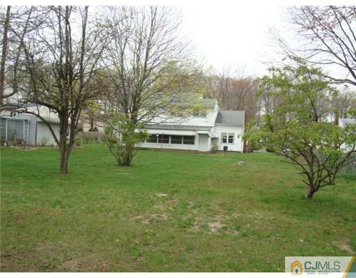12 Hilltop Road Edison, NJ 08820 - Photo 22 of 23 a view of a house with a big yard