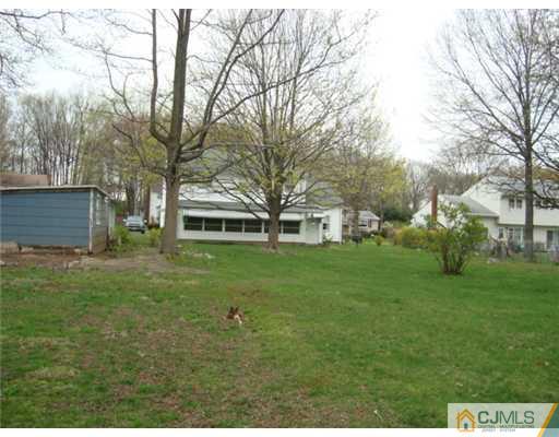 12 Hilltop Road Edison, NJ 08820 - Photo 23 of 23 a view of a house with a big yard