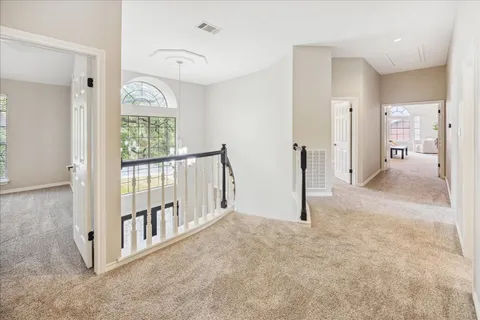 en view interior of a house with an entryway and stairs