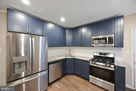 a bathroom with a sink and a window