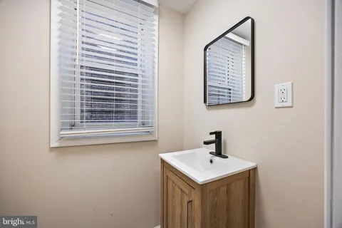 wooden floor in a room with a window