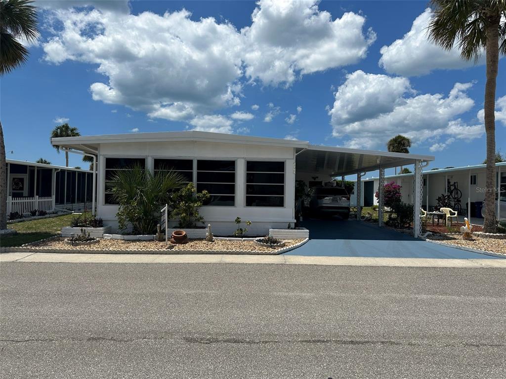 a front view of a house having patio