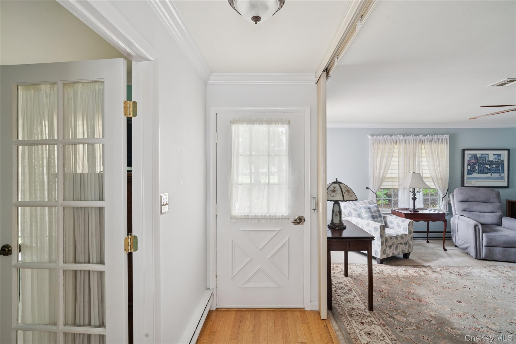 474 Darwen Drive, Unit B Ridge, NY 11961 - Photo 20 of 34 a living room with furniture and a table