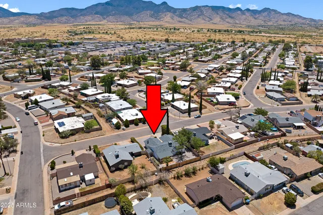 an aerial view of a city with lots of residential buildings