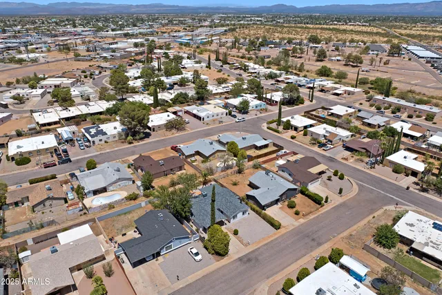 an aerial view of residential building with parking space