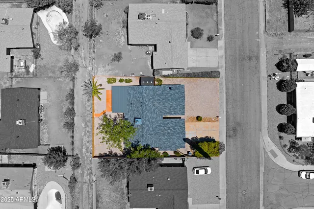 an aerial view of residential house with outdoor space
