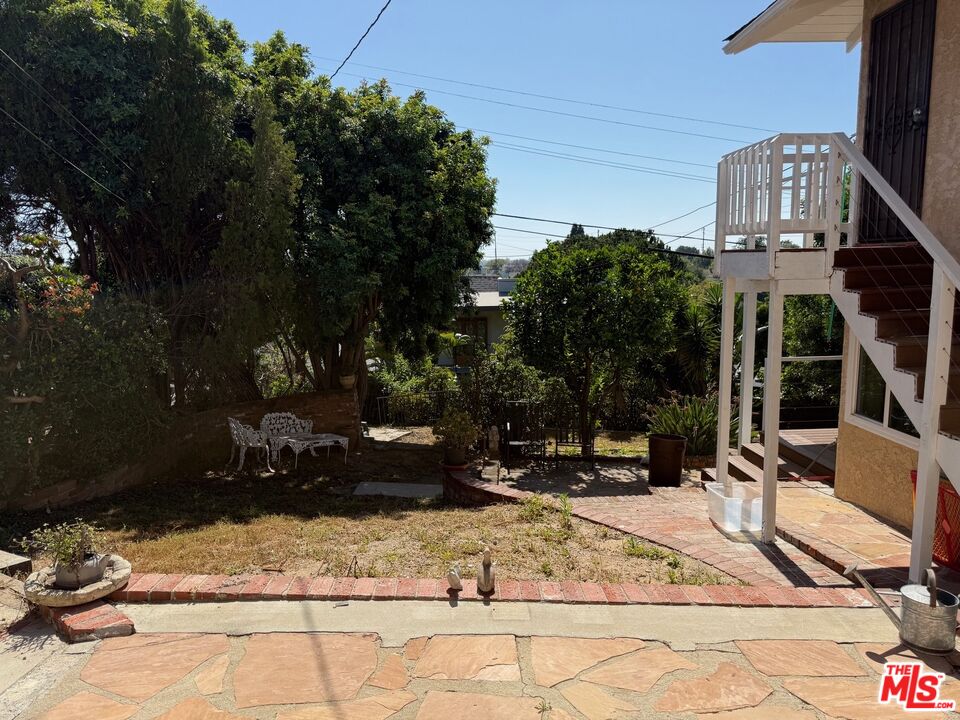 3237 Midvale Avenue Los Angeles, CA 90034 - Photo 24 of 24 a view of a building with cars park